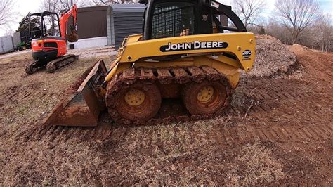 Skidsteer digging a pond 